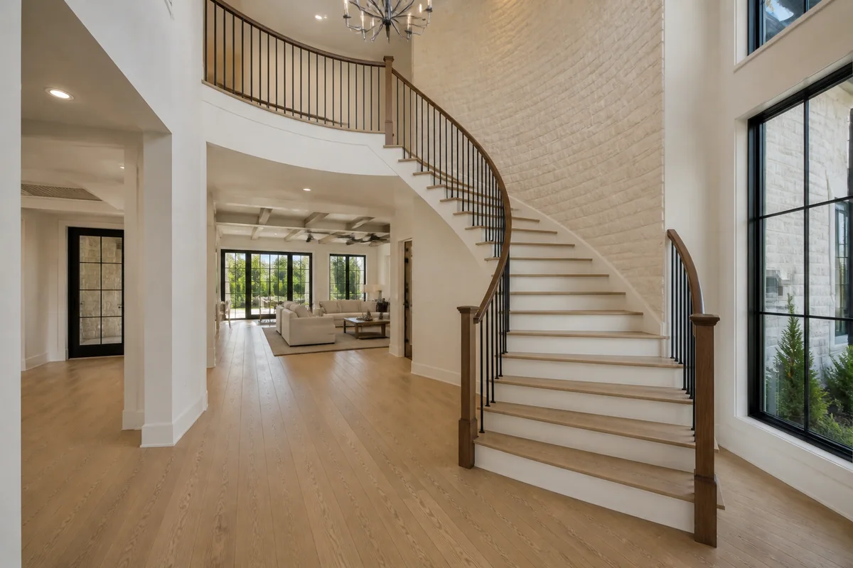 Foyer And Winding Staircase photograph from the cohesive sample property shoot.
